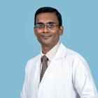 Dr. Arul K