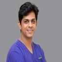 Dr. Suman B