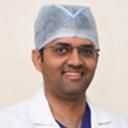 Dr. Abhishek B