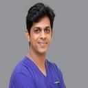 Dr. Suman B