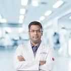 Dr. Arun V